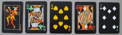 arpak four color playing cards black background
