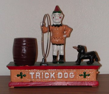 trick dog cast iron bank